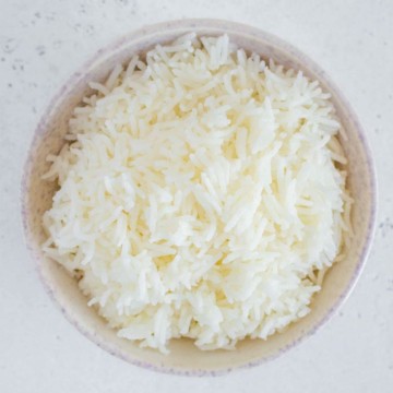 cooked rice in a bowl top view