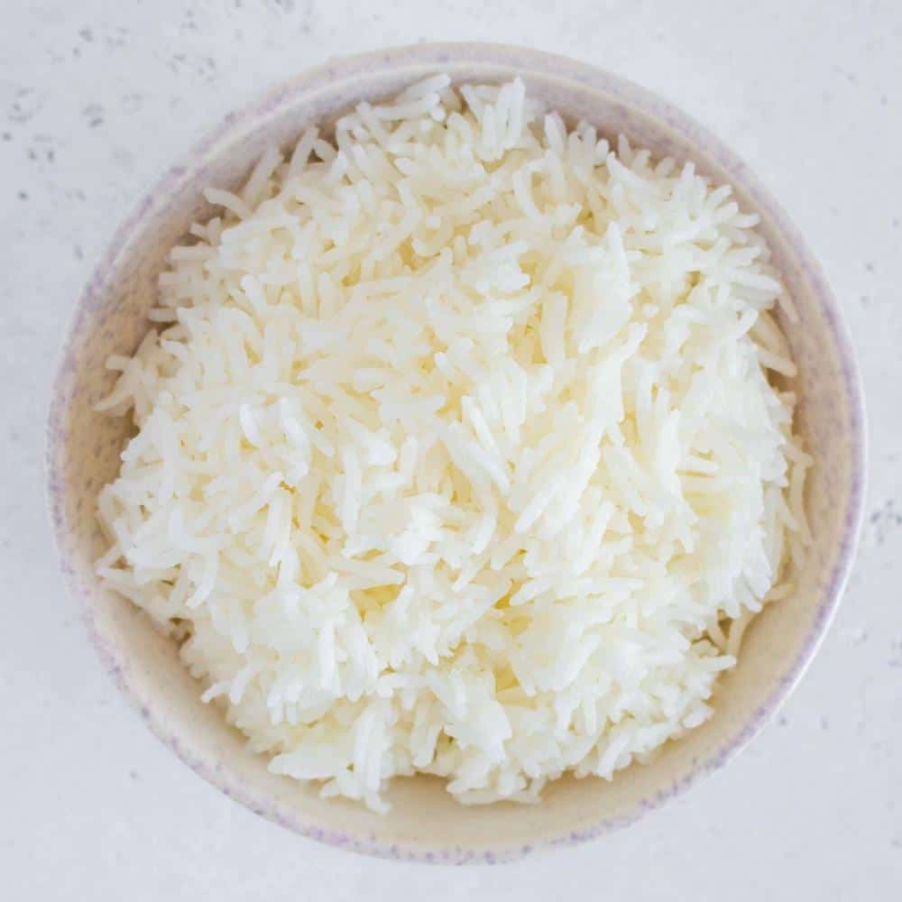 cooked rice in a bowl top view