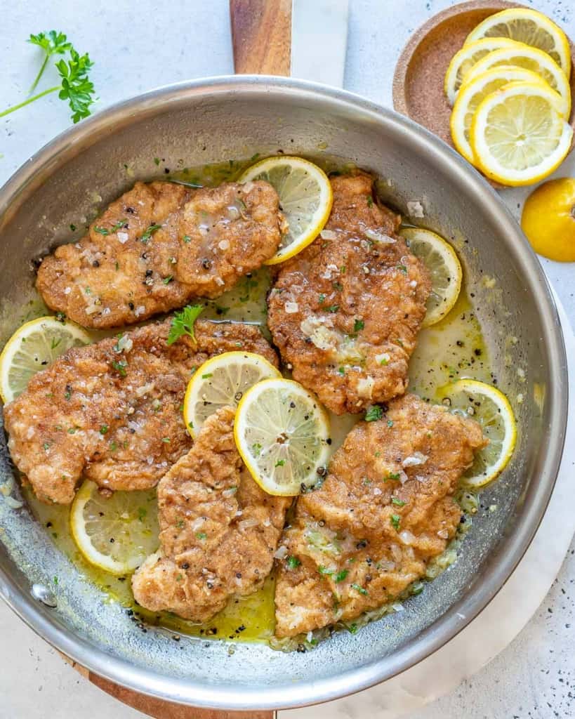 top view chicken cutlets in a pan
