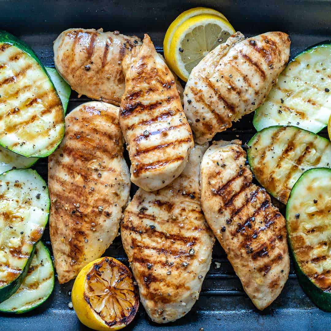 grilled chicken and zucchini on a grill pan