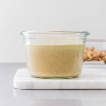 side view of cashew butter in a jar