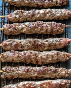 kafta skewers on the grill pan that are already grilled