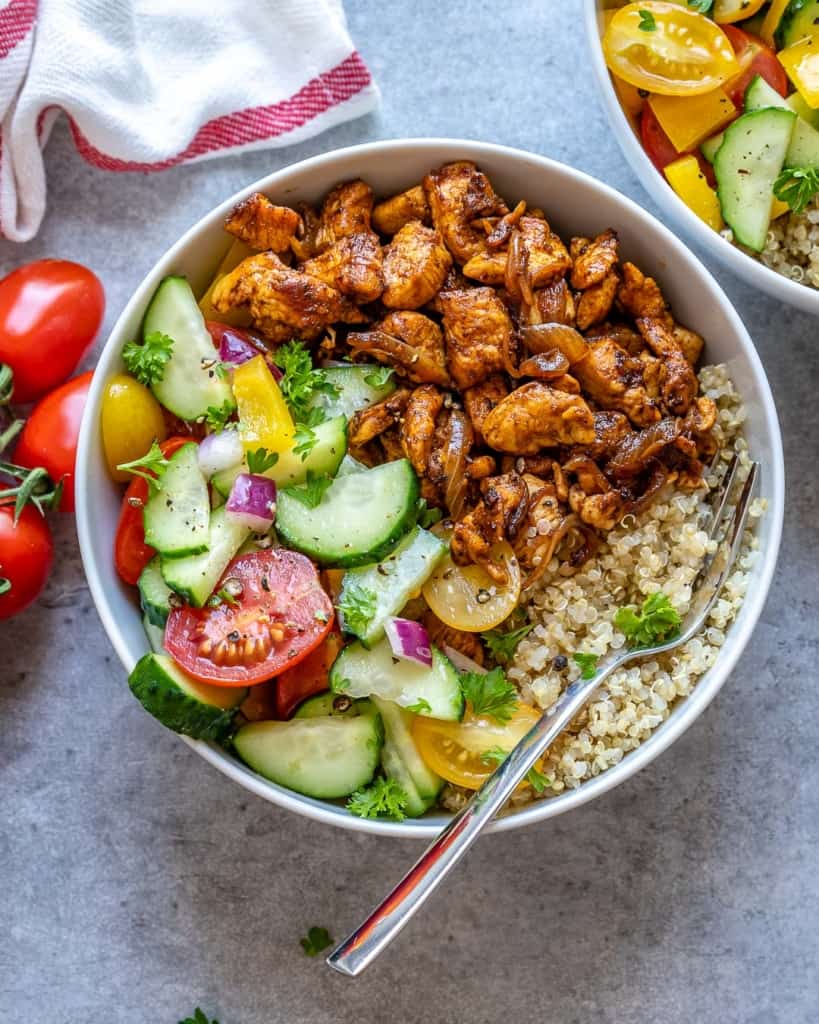 top view of chicken shawarma bowl with fork in bowl