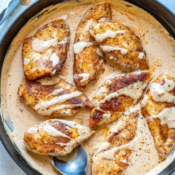 top view creamy cajun chicken in skillet