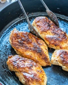 cooked chicken breast on a skillet