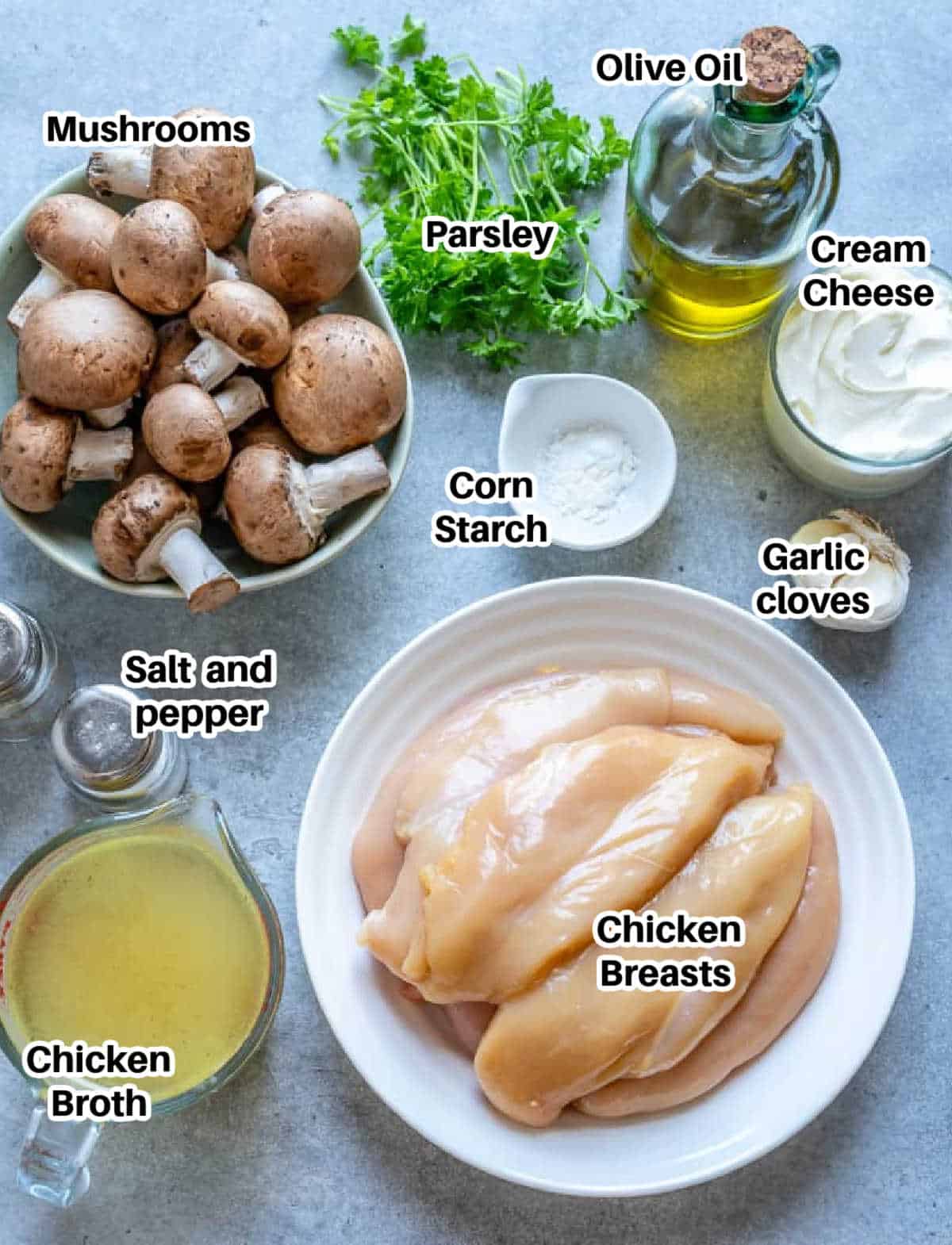 ingredients to make creamy mushroom chicken laid out.