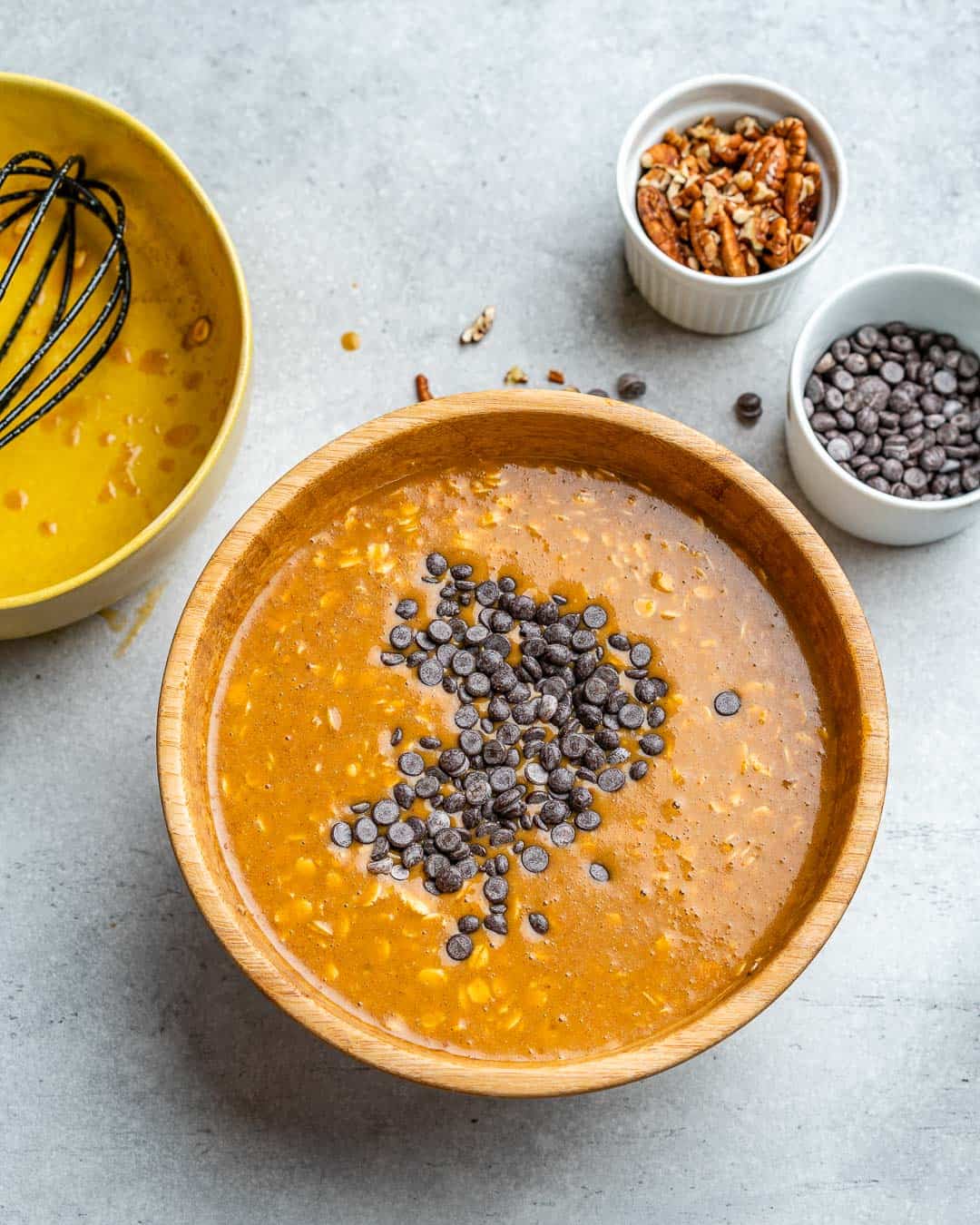 chocolate chips over pumpkin oatmeal batter 