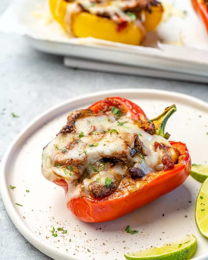 Bell pepper, with stuffing, on a plate. 