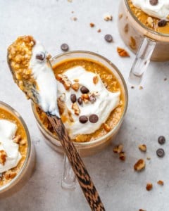 spoonful of overnight oats over cup