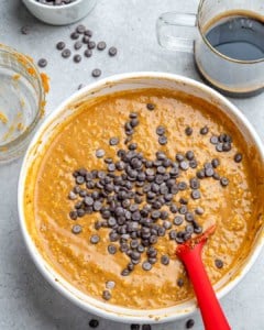 chocolate chips poured over overnight oats mixture