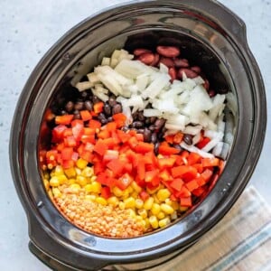 top view of all veggie ingredients added to the crockpot