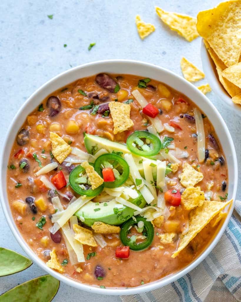 top view of tortilla soup in a white bowl