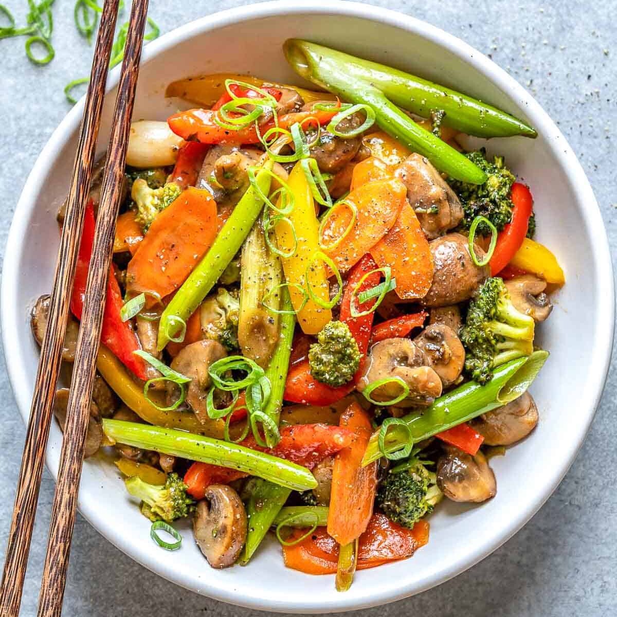 a bowl filled with vegetable stir fry.