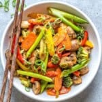 A round bowl filled with vegetable stir-fry.