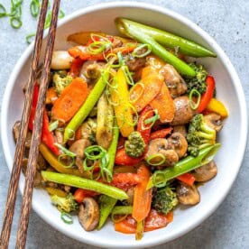 A round bowl filled with vegetable stir-fry.