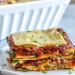 side view of lasagna piece on a plate