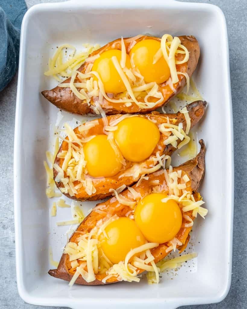 Top down shot of eggs on sweet potatoes. 
