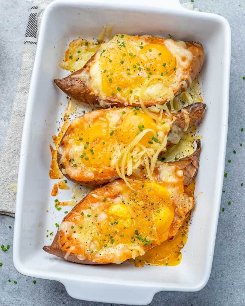 top view baked sweet potatoes with eggs and cheese