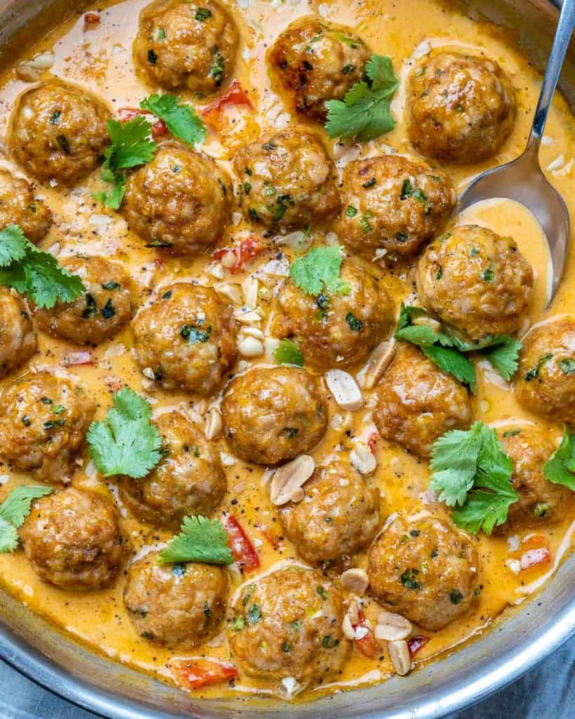 close up image of turkey meatballs in a silver skillet