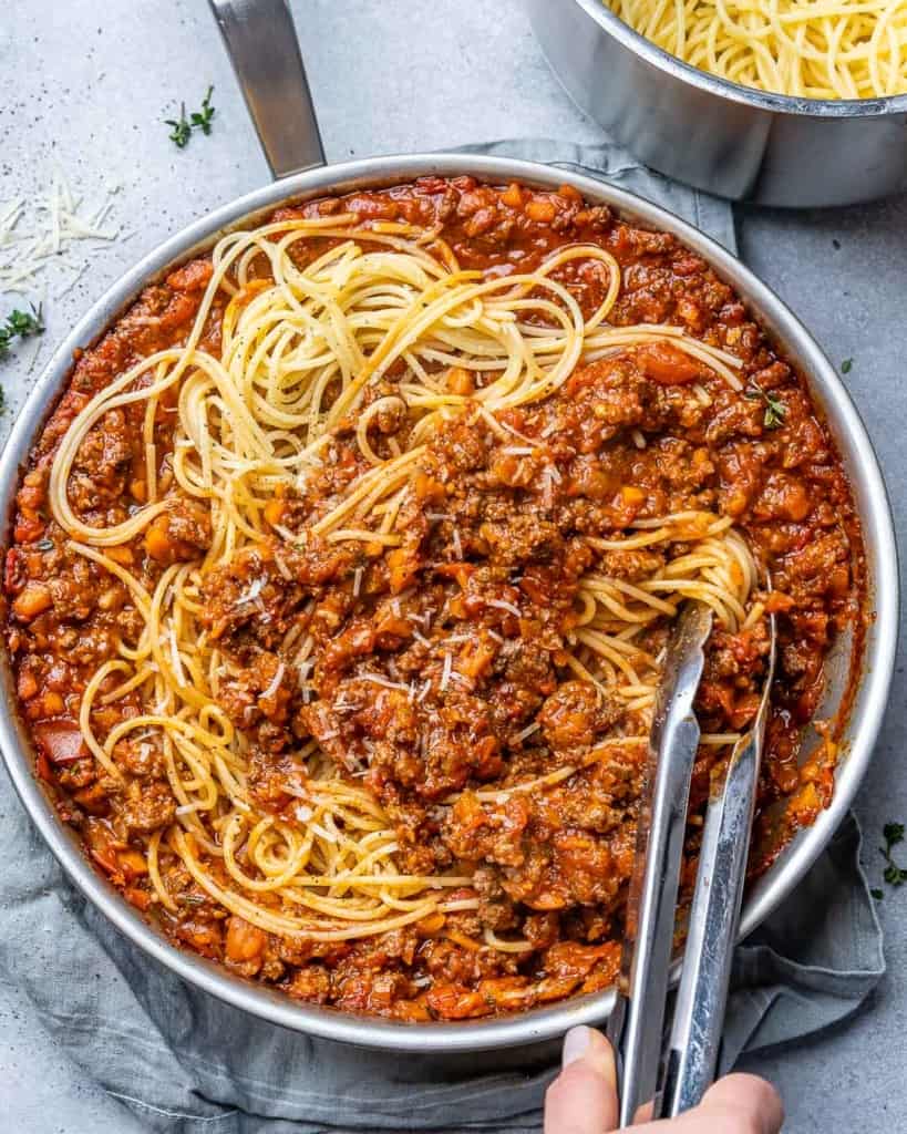 Bolognese with pasta in a pan.