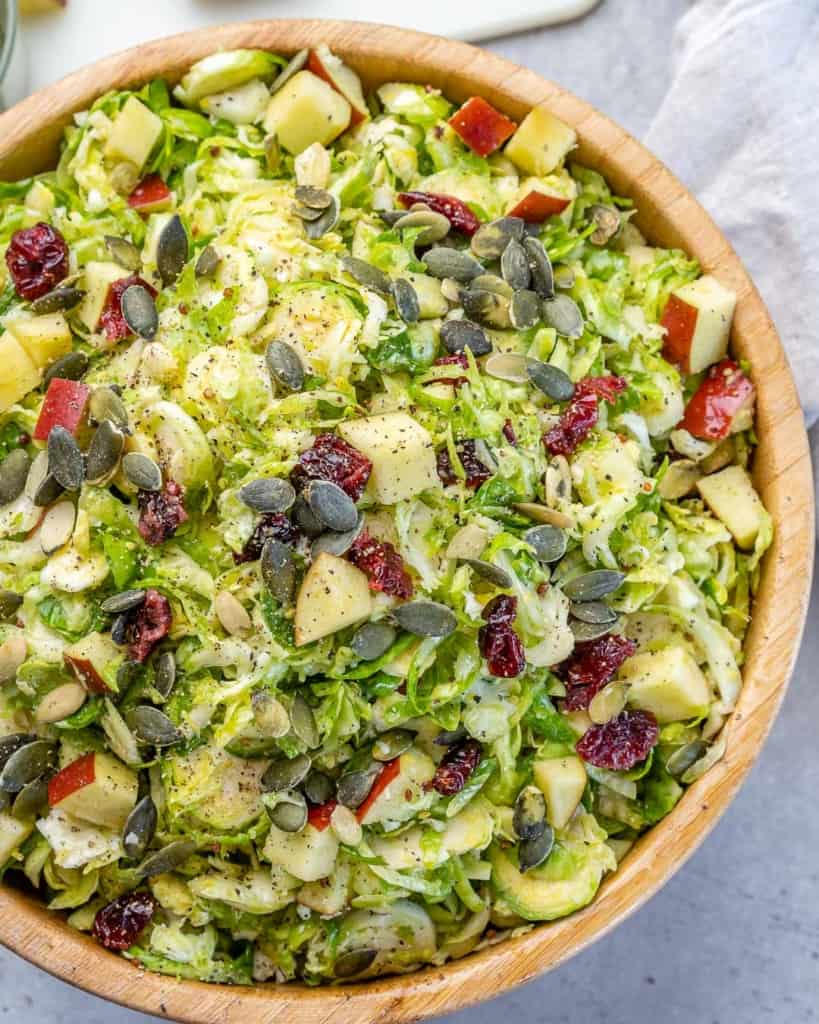 Shaved Brussels sprouts salad in a bowl.