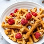 side shot keto waffles with raspberry garnish