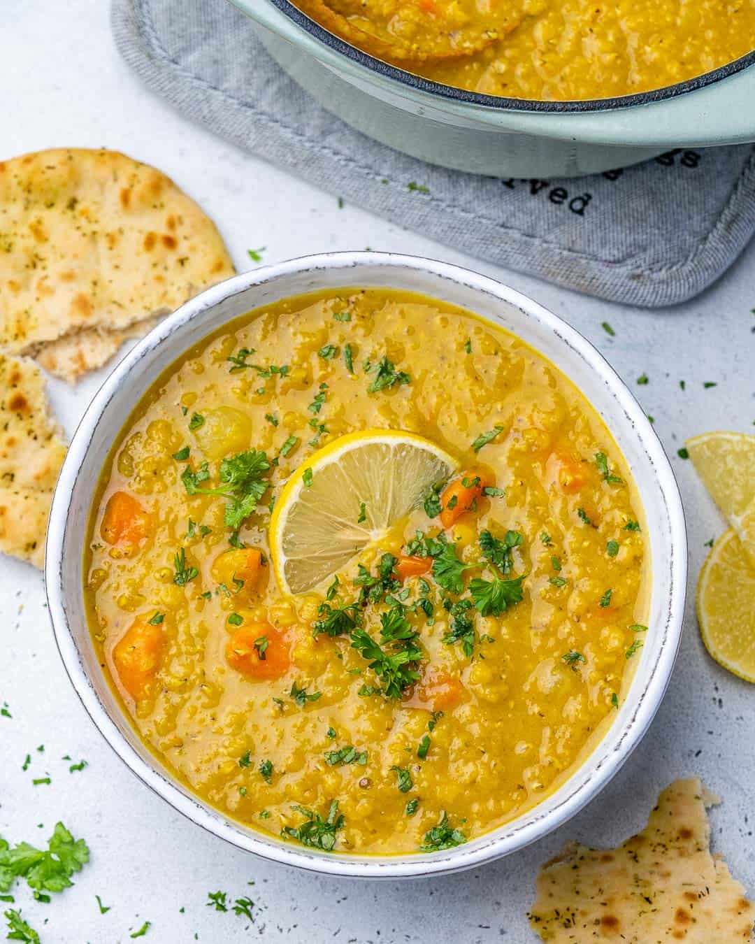Bowl of Middle Eastern Red Lentil Soup with pot in background