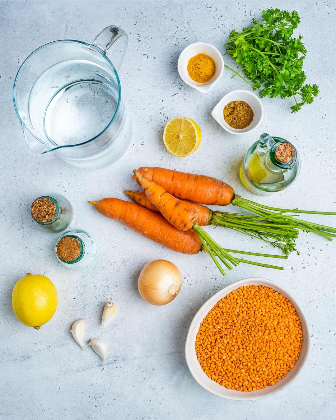 Ingredient for red lentil soup on counter before cooking