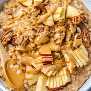 Top down shot of oatmeal bowl with a spoon.