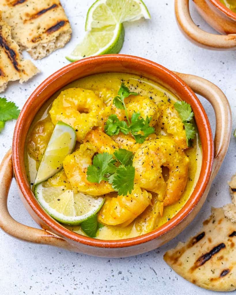 top view shrimp curry in brown bowl