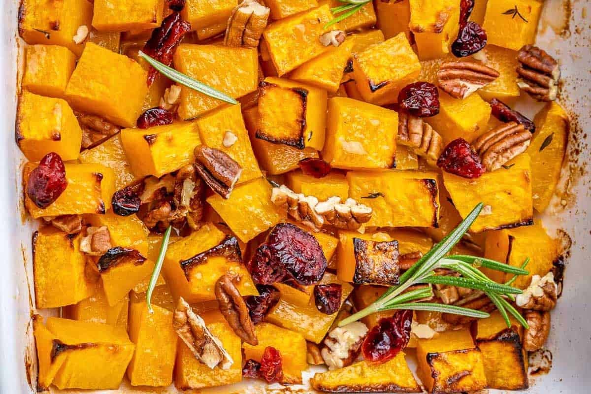 roasted butternut squash squares in a pan.