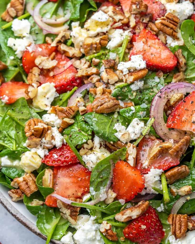 close up strawberry spinach salad 