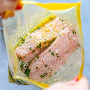 Salmon marinated in a Ziploc bag.