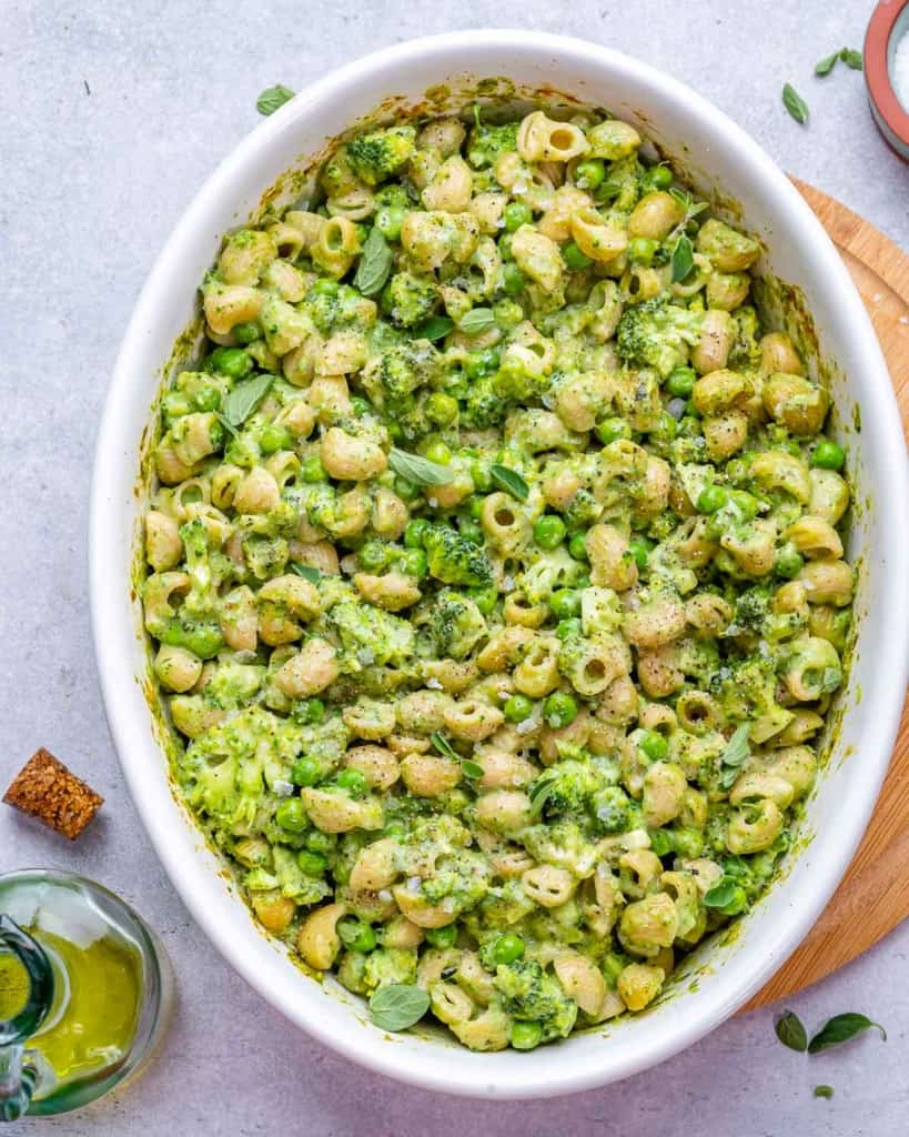 top view green ,ac and cheese in a white dish