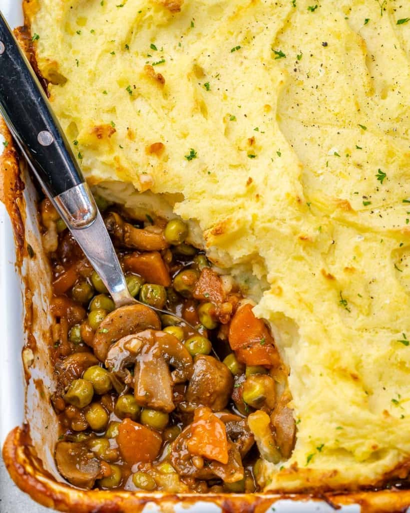 close up shepherd's pie with spoon in dish