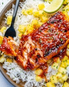 close up bbq chicken over rice with mango salsa