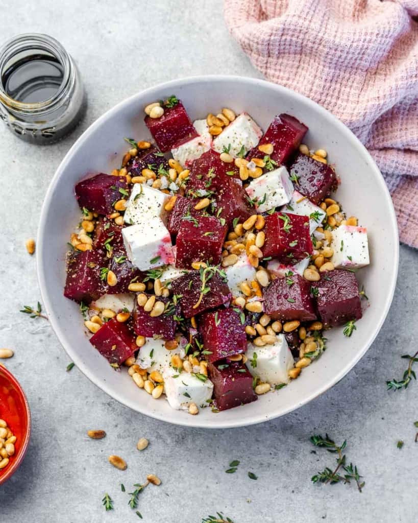 Roasted beet salad in white bowl