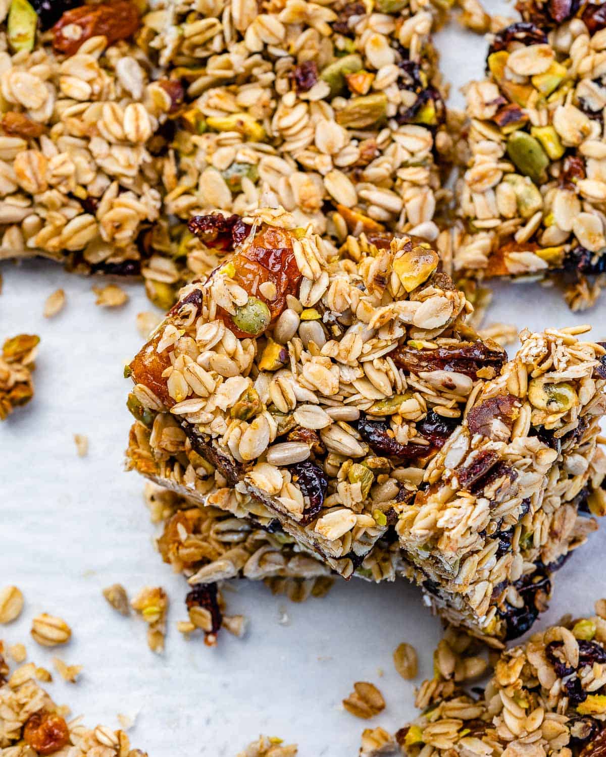 Oatmeal Granola Bars from Scratch 7 Top-down view of several golden-brown homemade oatmeal granola bars, neatly arranged on a clean flat surface, ready to be enjoyed.