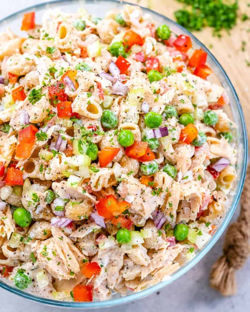 top view of tuna macaroni salad in a clear bowl