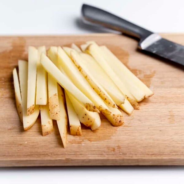 potato slices on cutting board