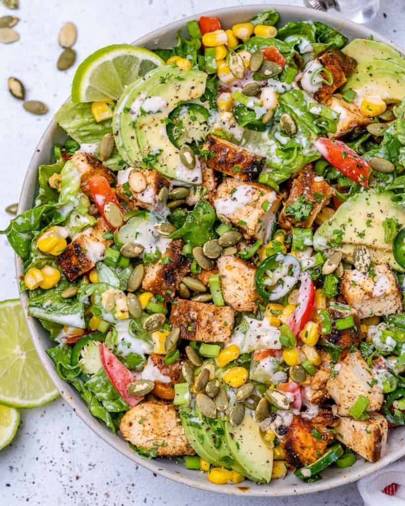 top view chopped salad with veggies and chicken