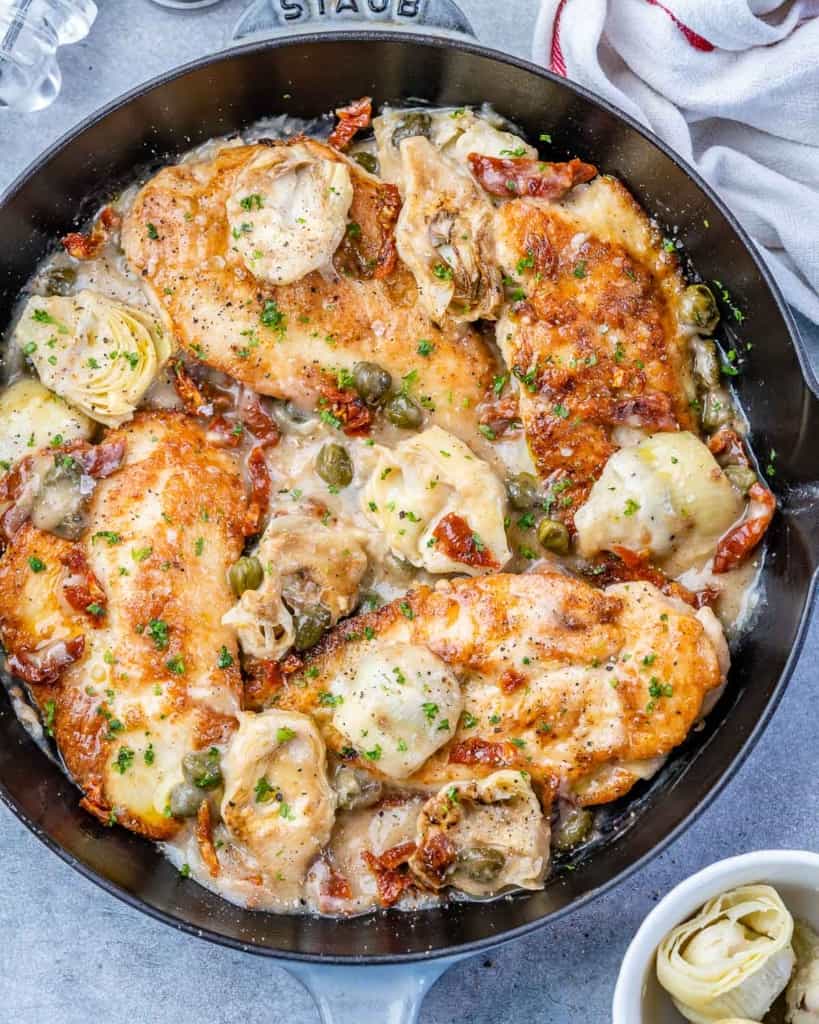 top view Mediterranean Chicken in a black skillet