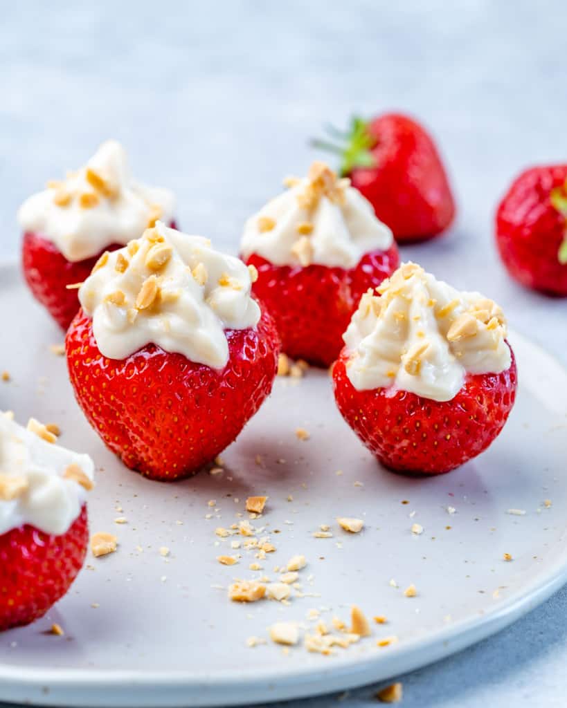 stuffed strawberries on a white plate 
