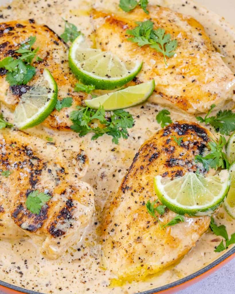 one pan of creamy chipotle chicken with limes and cilantro