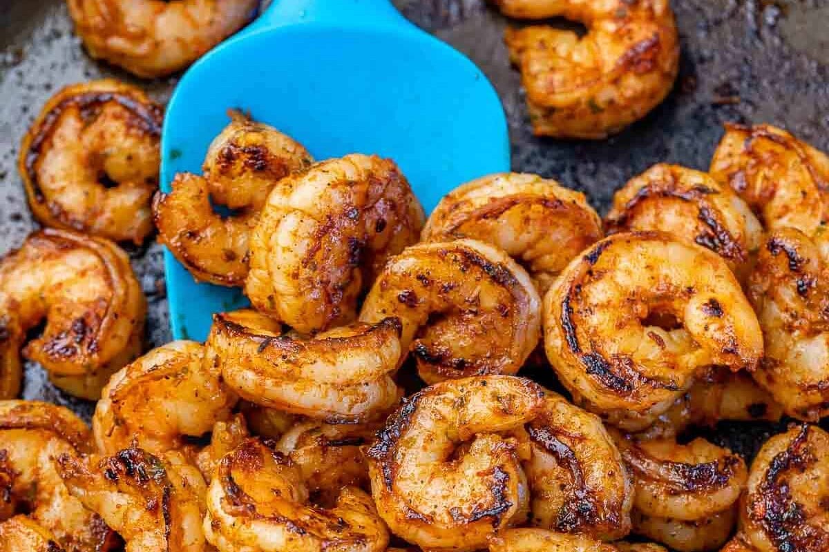 cooked shrimp in skillet for the shrimp burrito bowl