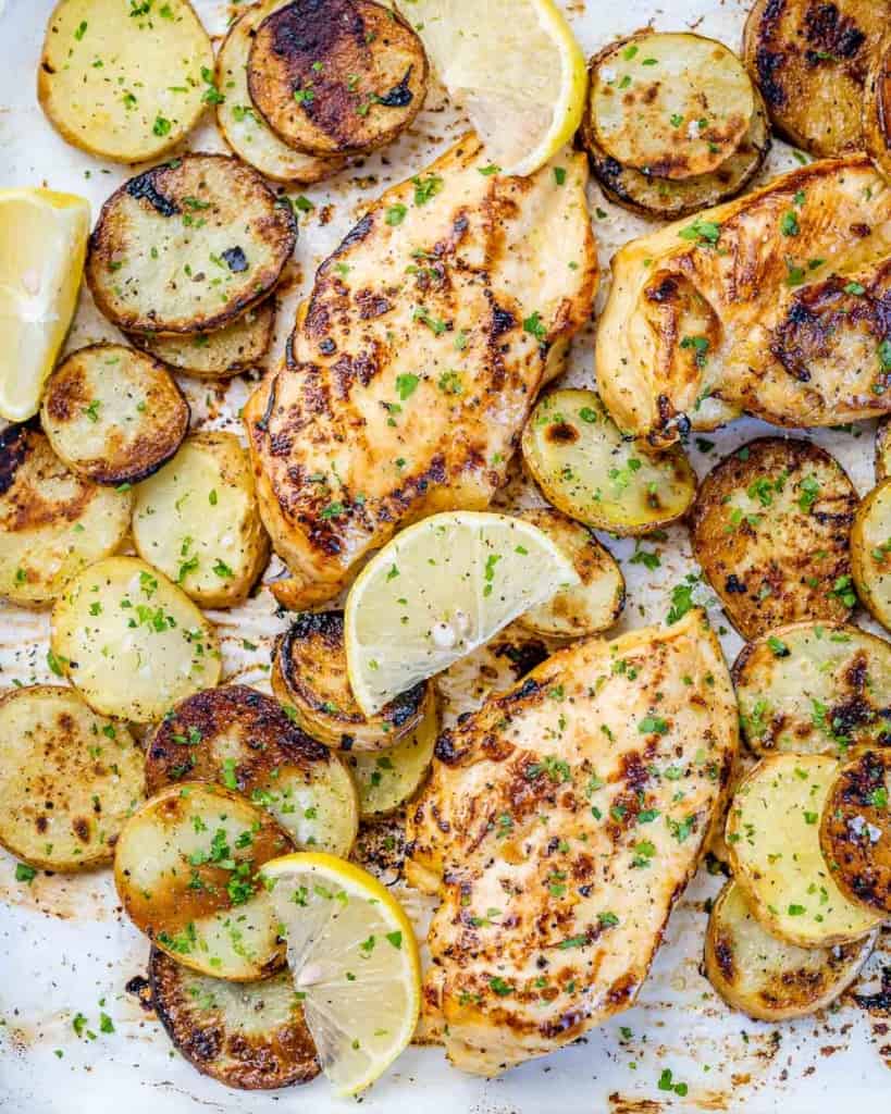 close up baked lemon chicken with potatoes 