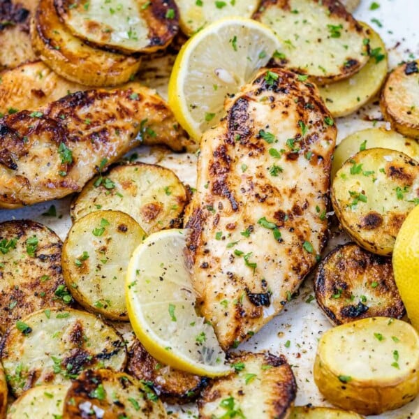 close up and side shot of chicken breast with potatoes