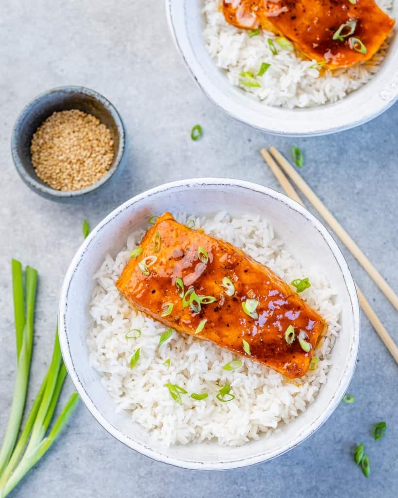 top view of honey salmon over a bowl of rice