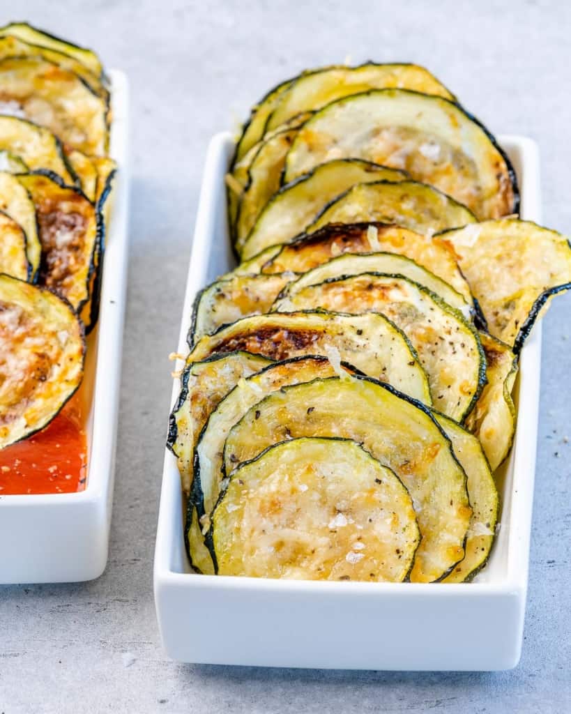 side of of zucchini chip in a white ceramic dish