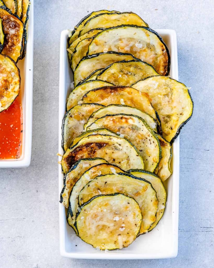 top view of zucchini chips in a dish 